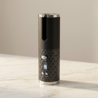 Rizador de pelo automático inalámbrico negro con pantalla LCD encendida sobre superficie de mármol
